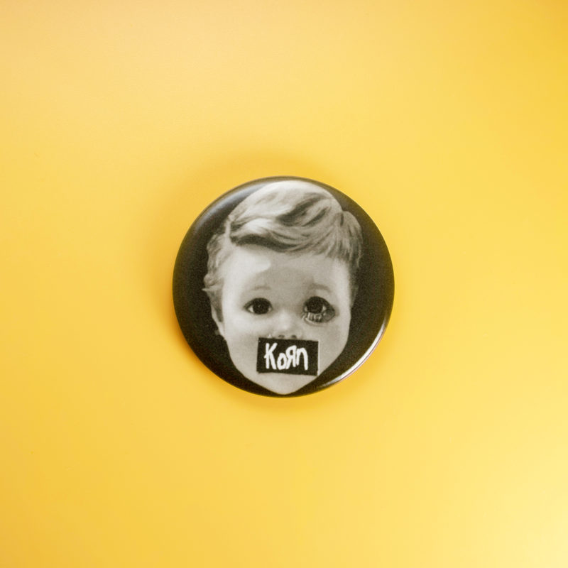 Korn BabyDollHead 1.5in Pin | 90s Nu-Metal Creepy Nostalgia