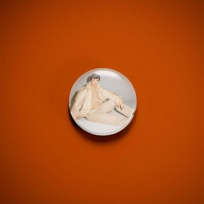 Nathan Fielder GQ Khaki 1in Pin | Nathan Fielder 2010s Surreal Comedy