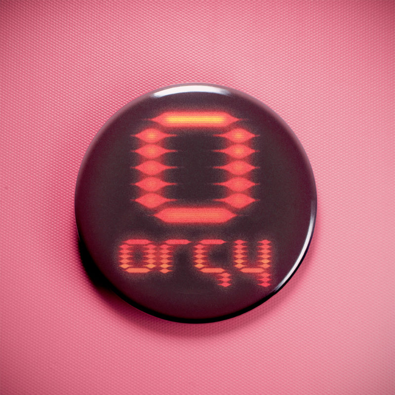 Orgy Red Orange Logo 2.25in Pin | Y2K Cyberpunk Pixel Art