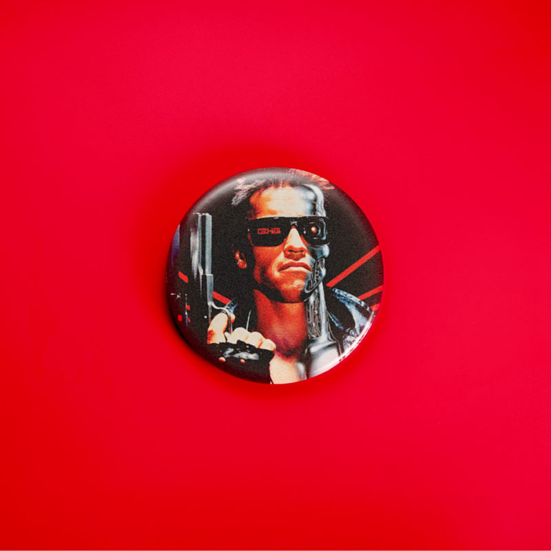 Terminator Movie Poster 1.5in Pin | Arnold Schwarzenegger 80s Cyberpunk